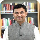 Prof. Satyam