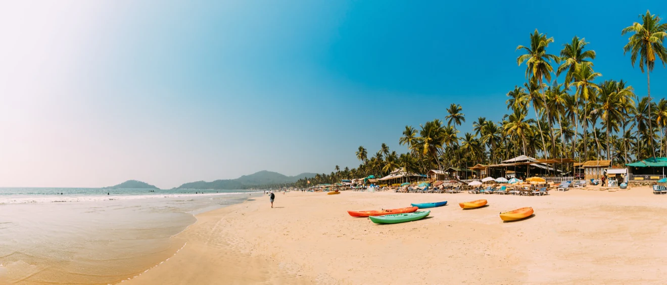 Founders on the beach outside the Goa venue at sunset